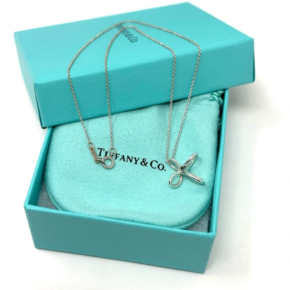 - AuthenticTiffany & CO. Elsa Peretti Infinity Cross Pendant Necklace. - Picture 9 of 11